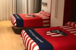 Bedroom at the Atlético de Madrid Residence, providing comfortable accommodation for football boarding school students.