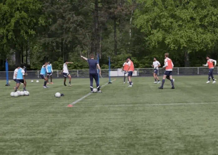 Players training on PSV Academy pitch at Campus De Herdgang.