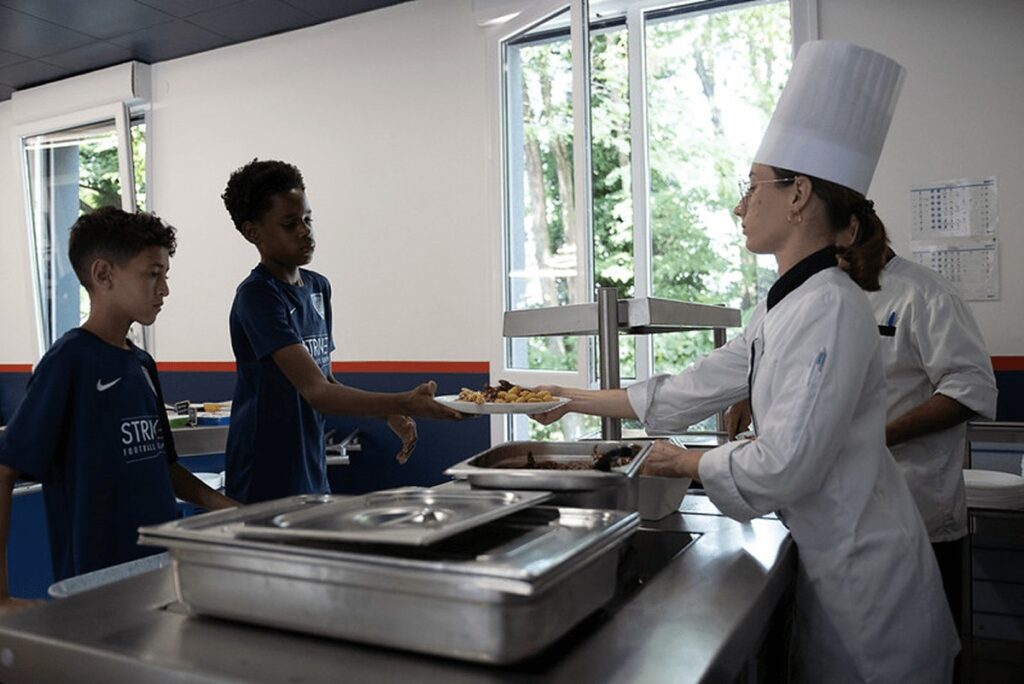 Chefs prepare fresh food on-site every day at the PSG Academy Pro Residence football boarding school in Evian, France.