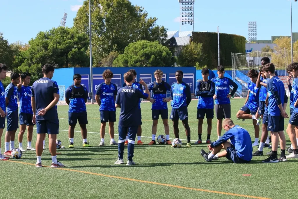 UEFA licensed coach training players at the football academy in Spain