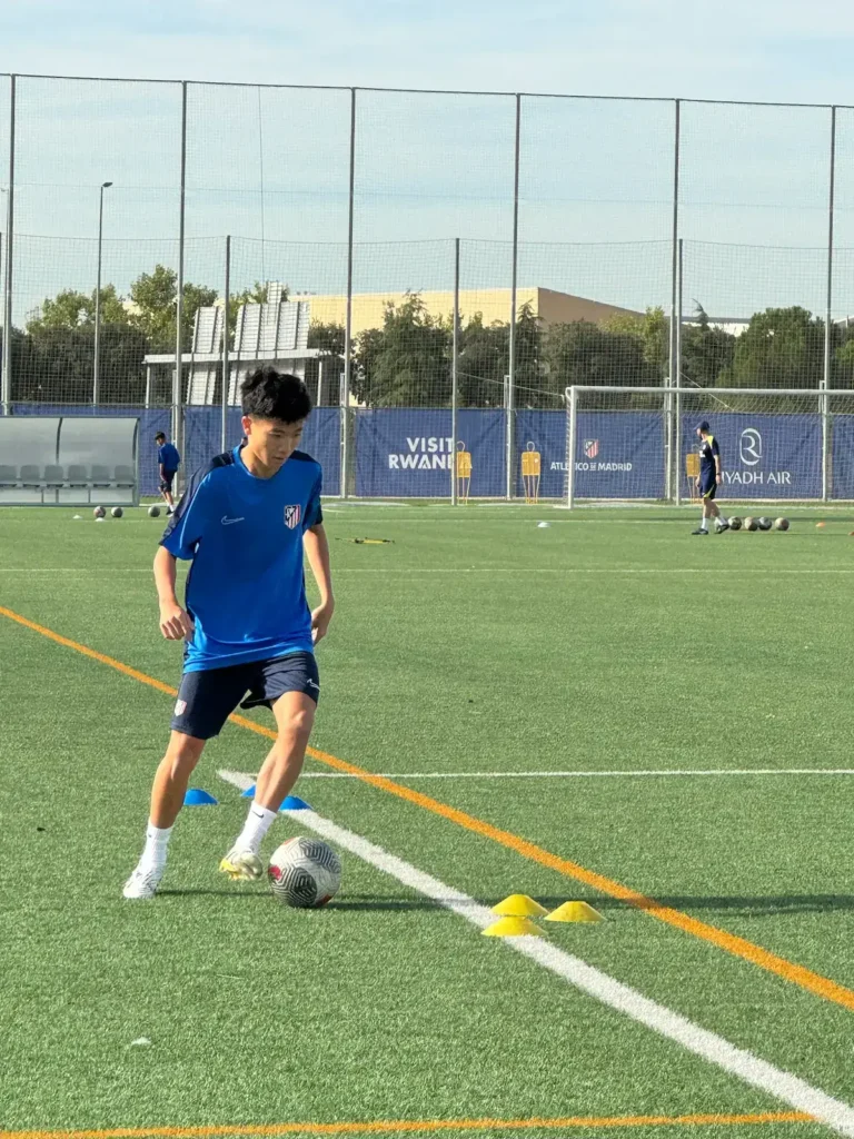 Mai Nguyen training at the Atlético de Madrid Academy pitch, September 2025